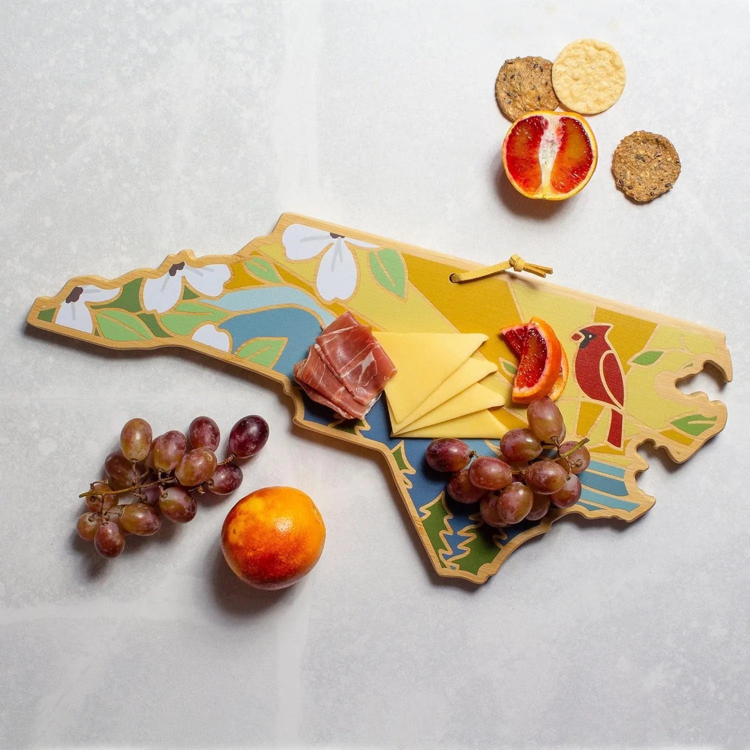 Totally Bamboo North Carolina State Shaped Cutting Board and Charcuterie Serving Platter with Artwork by Summer Stokes, Includes Hang Tie for Wall Display 18" x 8" x 5/8"