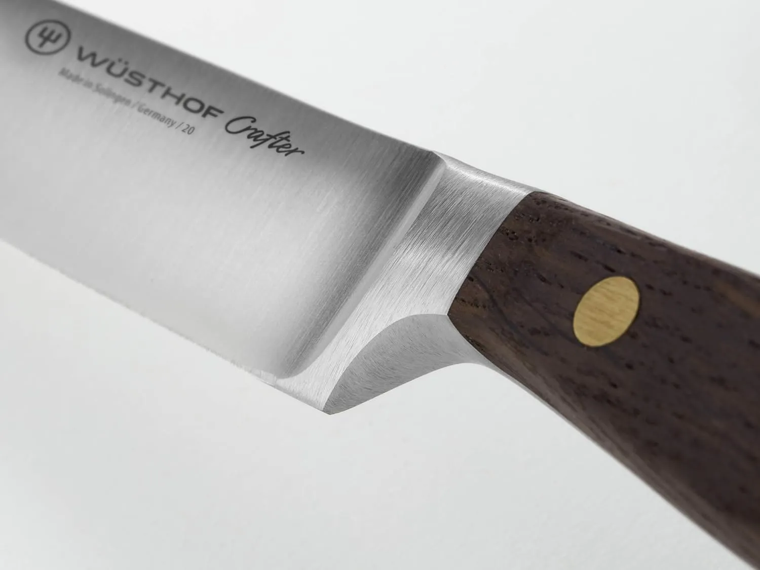 Wusthof Crafter 5" Stainless Steel Serrated Utility Knife with Smoked Oak Handle