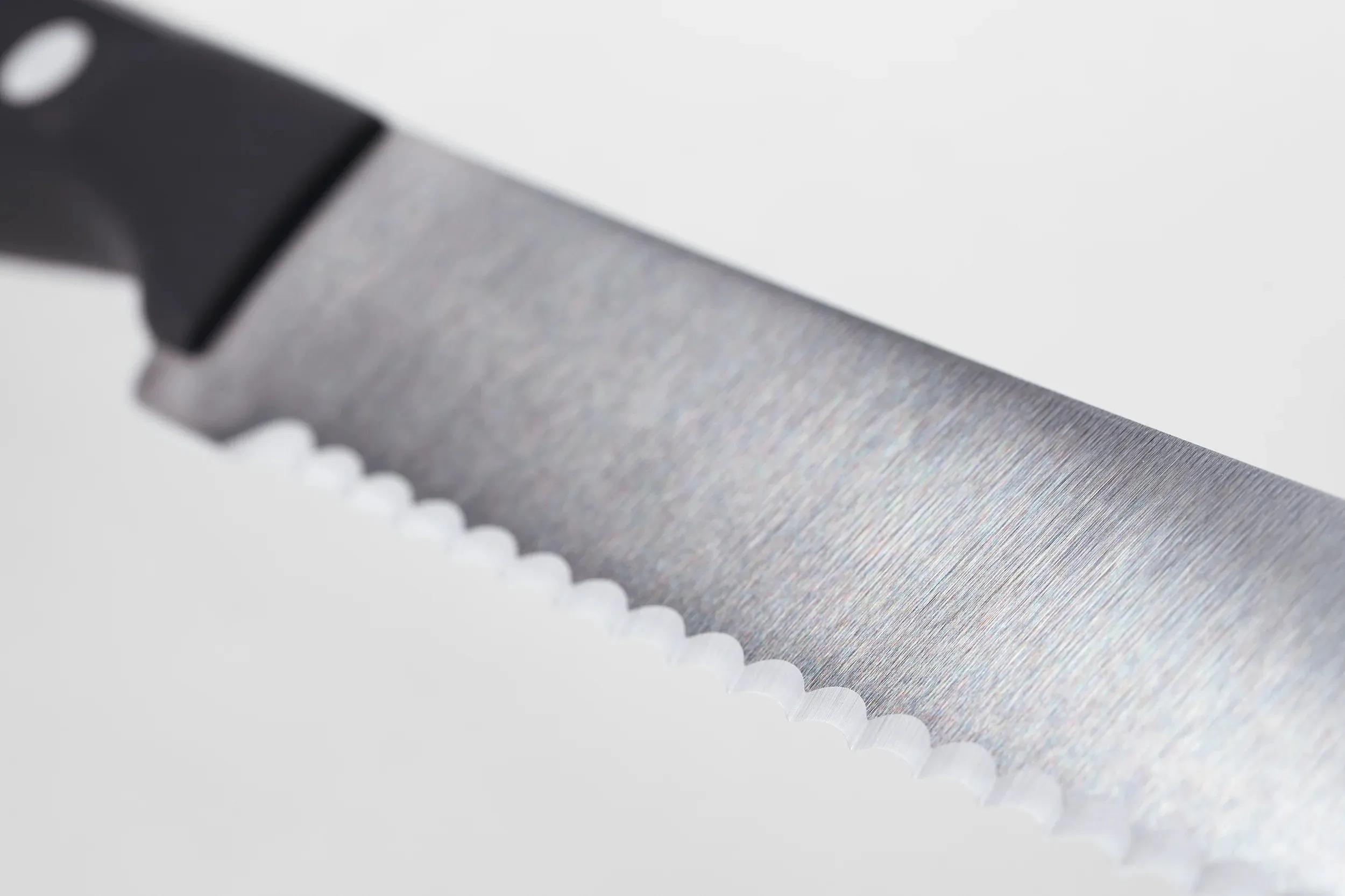 Wusthof Gourmet 4.5" Stainless Steel Serrated Utility Knife with Black Handle